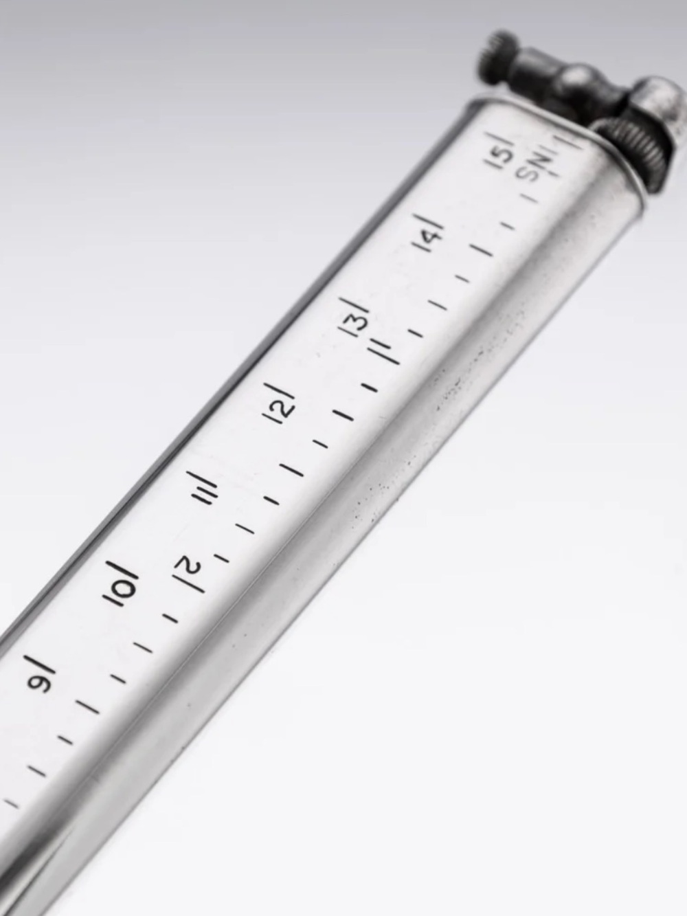 A novelty "ruler" by Dunhill, England, mid 20th century